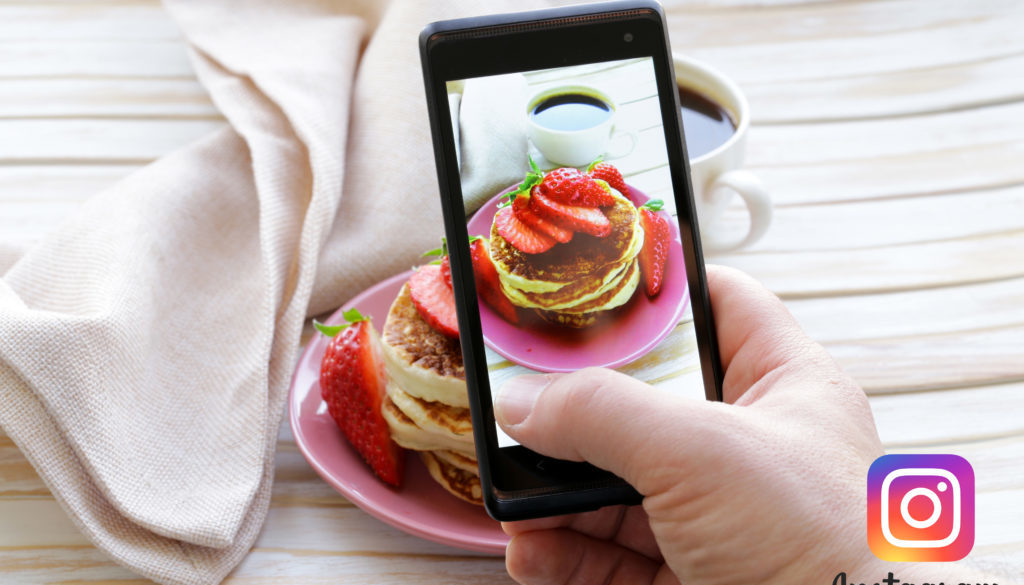 smartphone shot food photo - pancakes with strawberries for breakfast